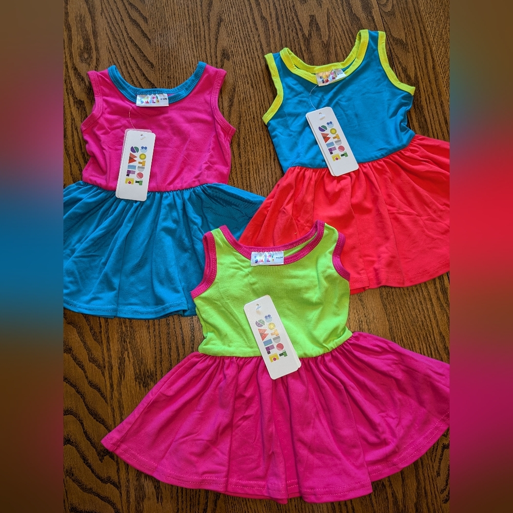 Dresses. Size 6-12 months
